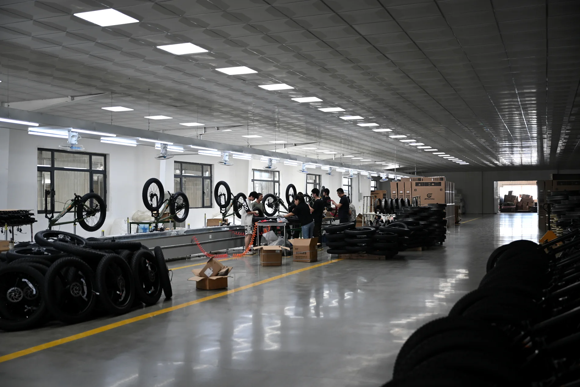 Electric bicycle assembly floor