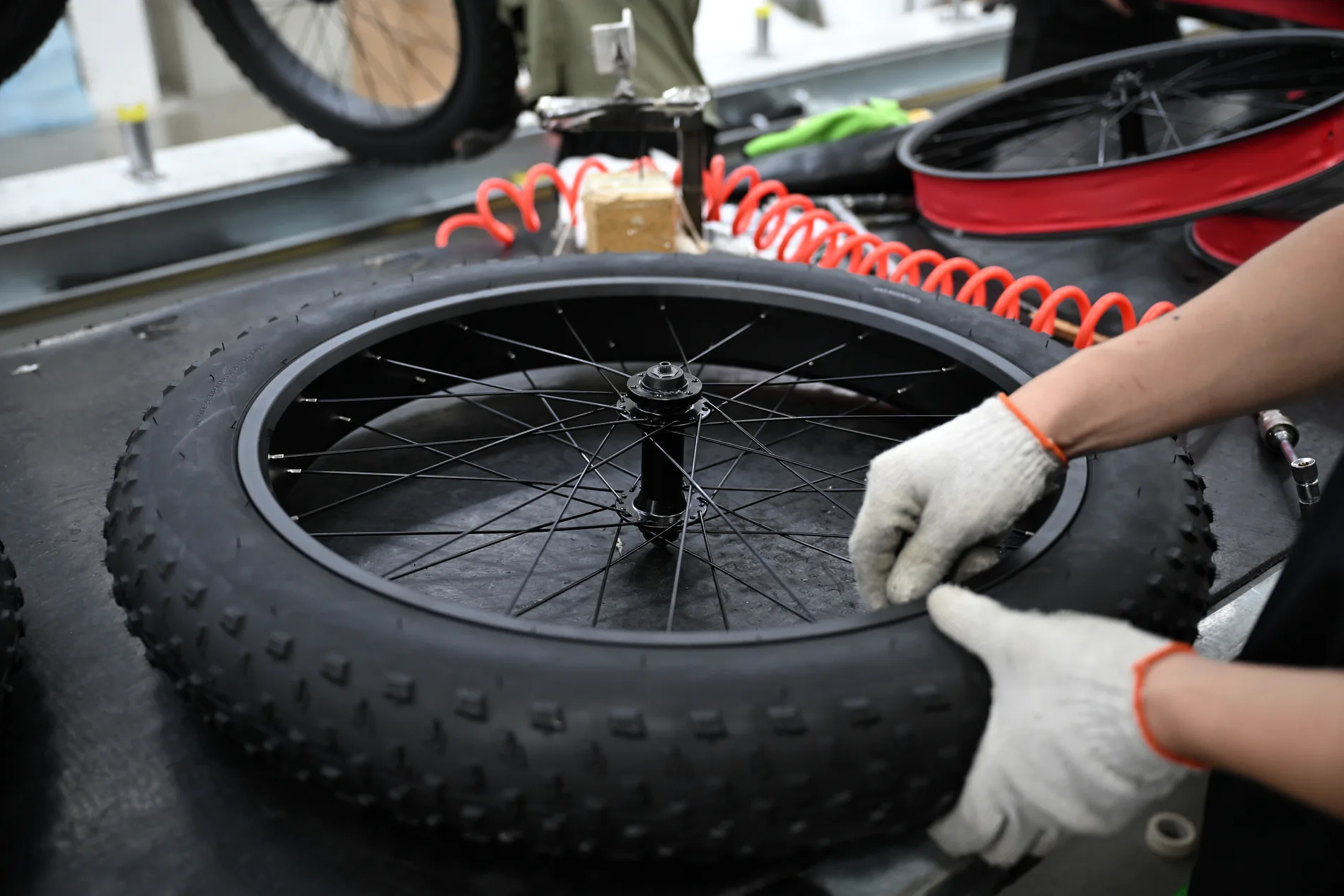 Wheel and tire assembly in production